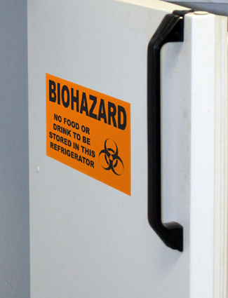 biohazard safety label on a refrigerator